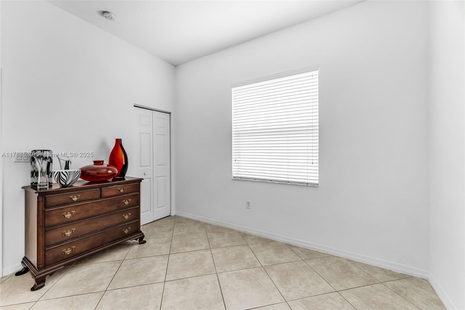 2819 Augusta Lane Homestead, FL 33035 - Photo 17 of 24 a room with toys and dresser