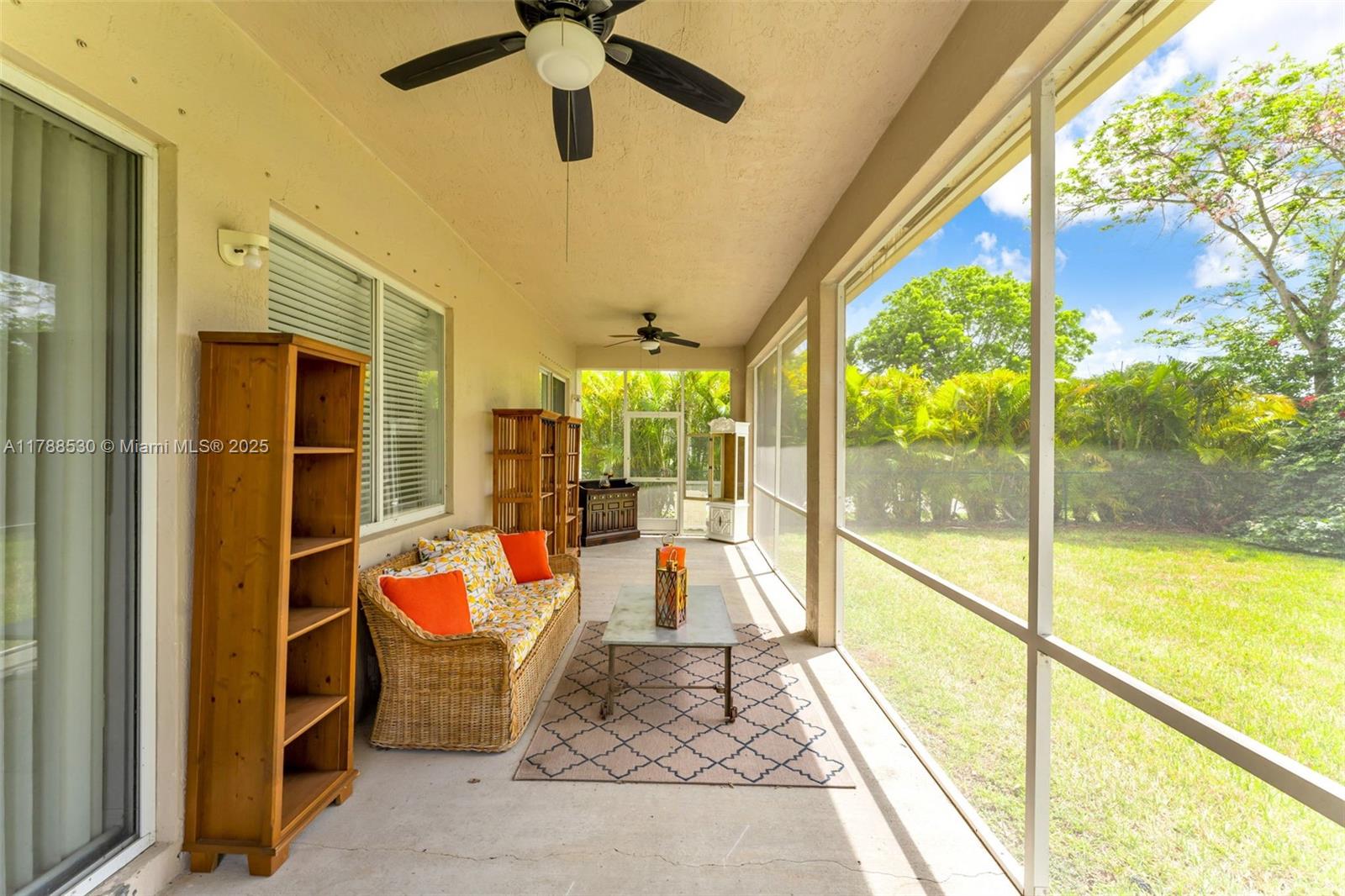 2819 Augusta Lane Homestead, FL 33035 - Photo 21 of 24 a living room with a large window