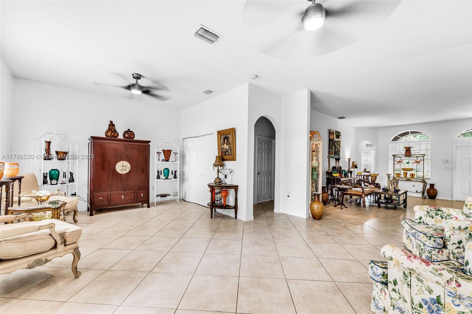 2819 Augusta Lane Homestead, FL 33035 - Photo 8 of 24 a living room with furniture and dining table