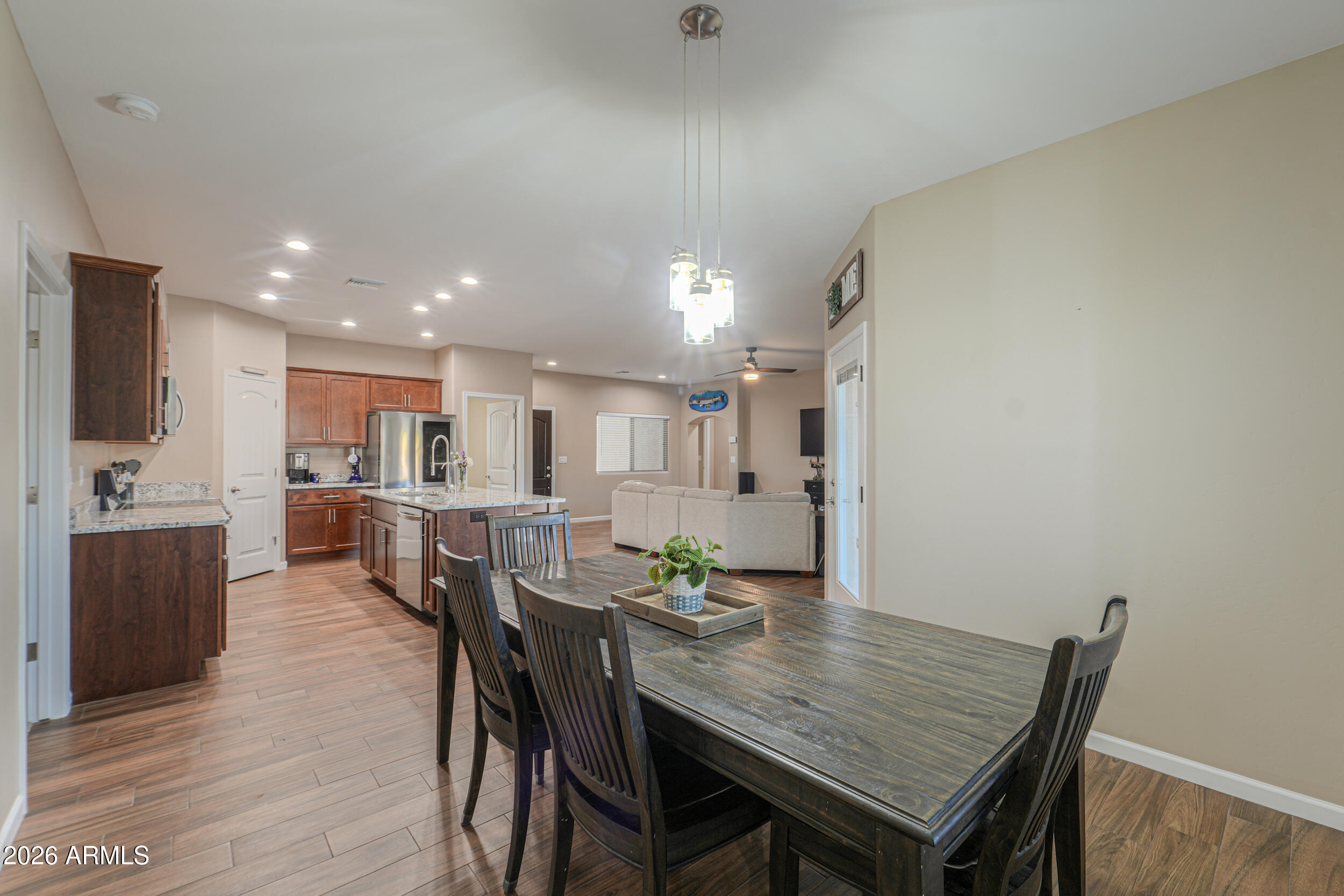 1487 South Mountain View Road Apache Junction, AZ 85119 - Photo 17 of 60 a view of a dining room with furniture