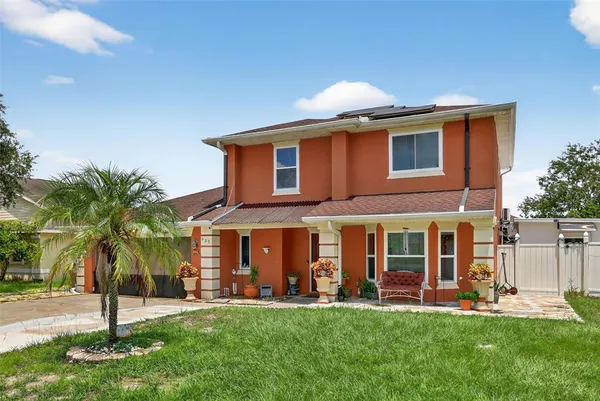 front view of a house with a yard