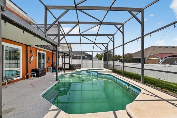 a view of yard with patio