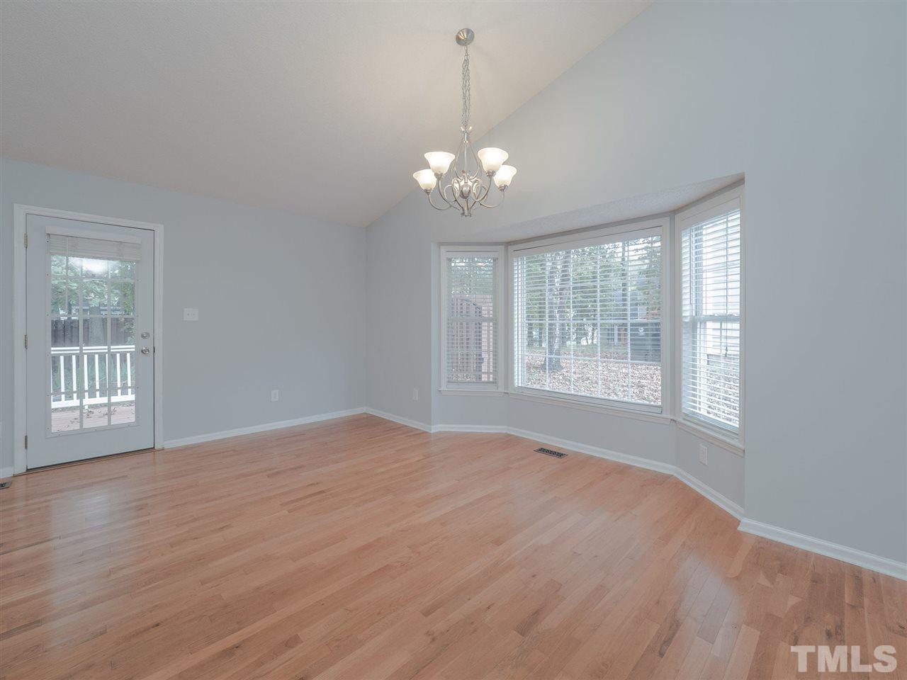 6816 Coventry Ridge Road Raleigh, NC 27616 - Photo 3 of 26 a view of an empty room with a window