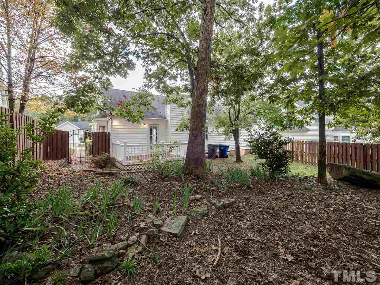 6816 Coventry Ridge Road Raleigh, NC 27616 - Photo 22 of 26 a view of a backyard with large trees