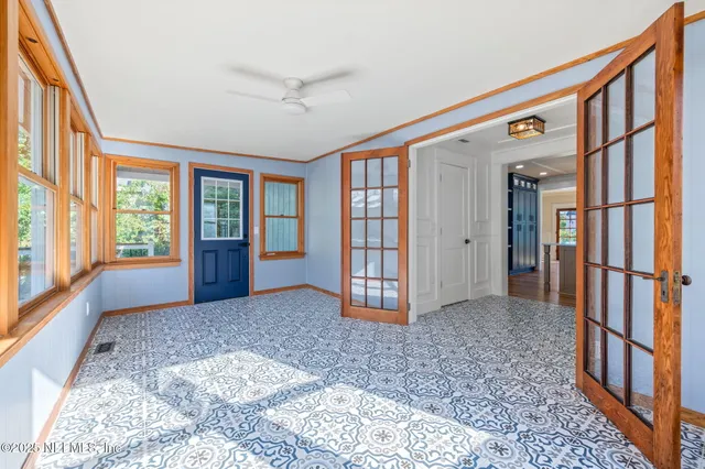 a view of livingroom with furniture and windows