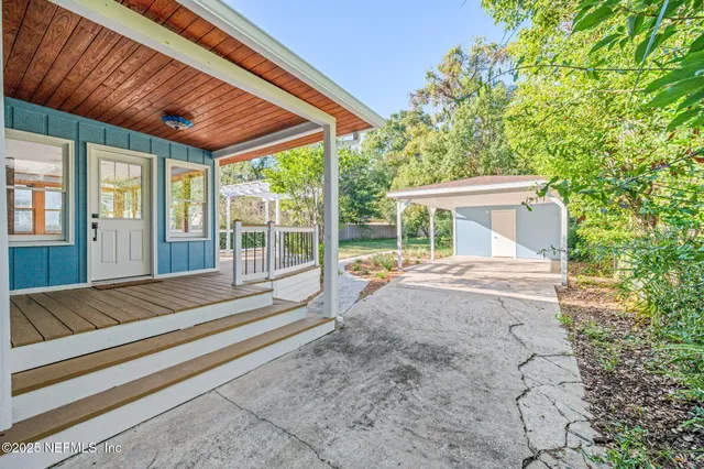 a view of swimming pool with outdoor seating