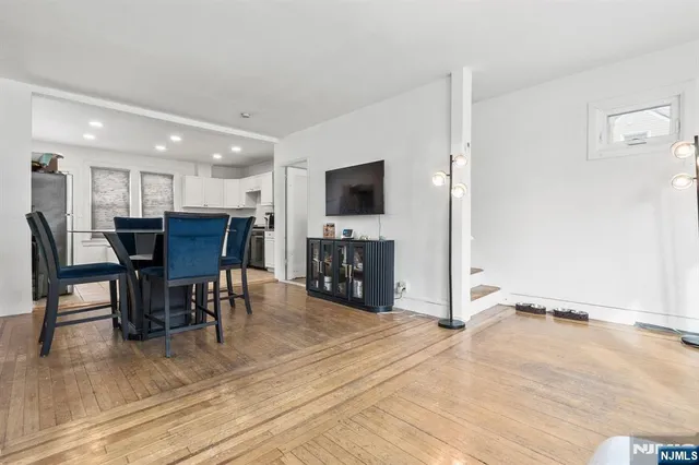 a view of a dining room with furniture
