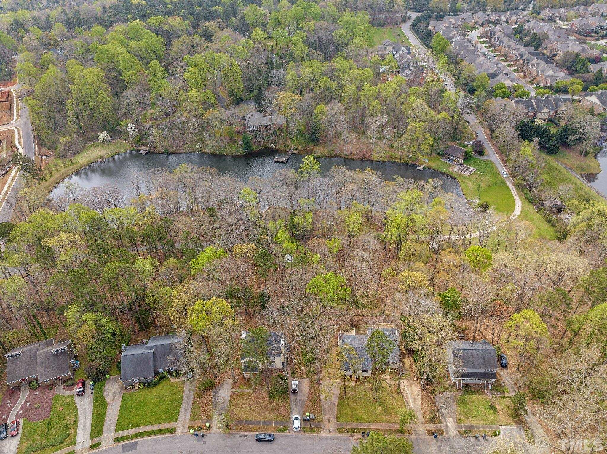 4006 Arckelton Drive, Unit 4006 & 4004 Raleigh, NC 27612 - Photo 16 of 34 a view of swimming pool and outdoor space