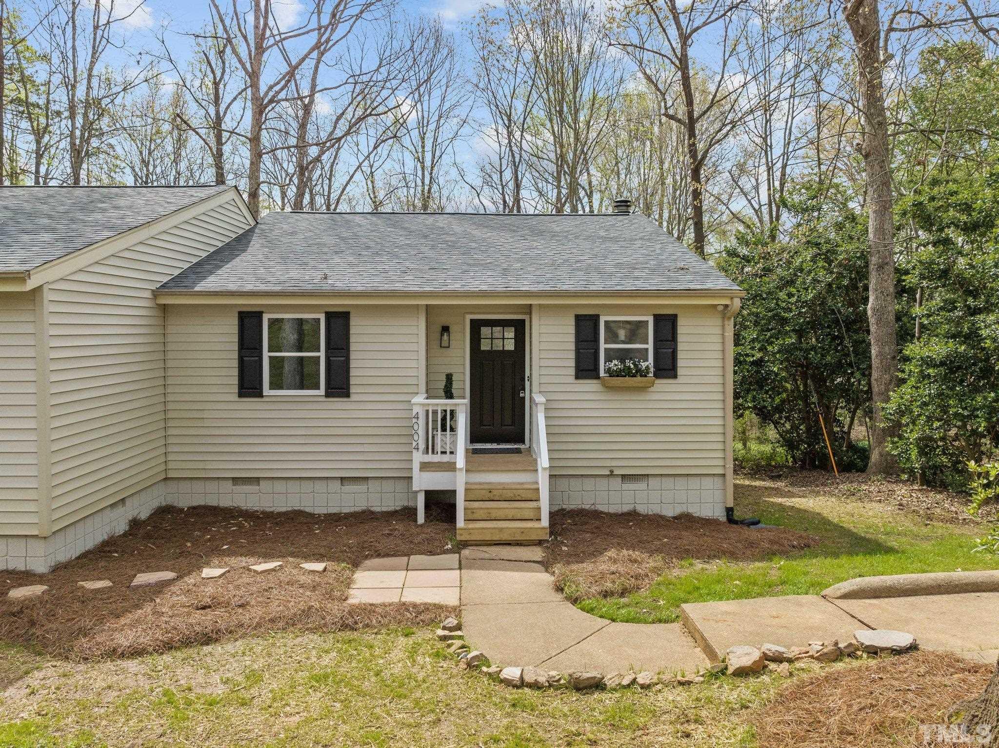 4006 Arckelton Drive, Unit 4006 & 4004 Raleigh, NC 27612 - Photo 2 of 34 a view of a house with backyard