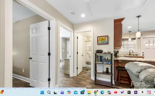 a close view of a utility room with washer and dryer