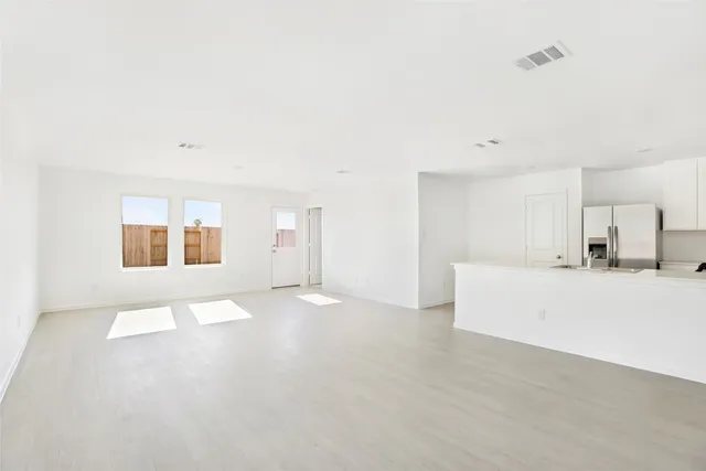 a kitchen with a sink and a window