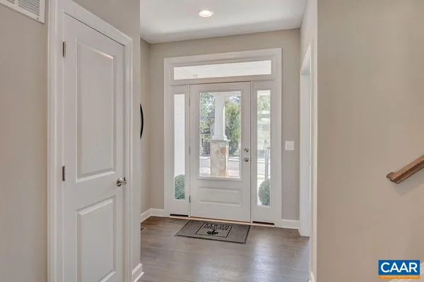 a bathroom with a fireplace and a mirror