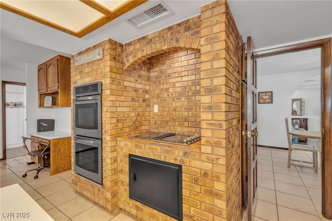 1780 Westwind Road Las Vegas, NV 89146 - Photo 34 of 61 Gourmet Kitchen with built in range and double ovens