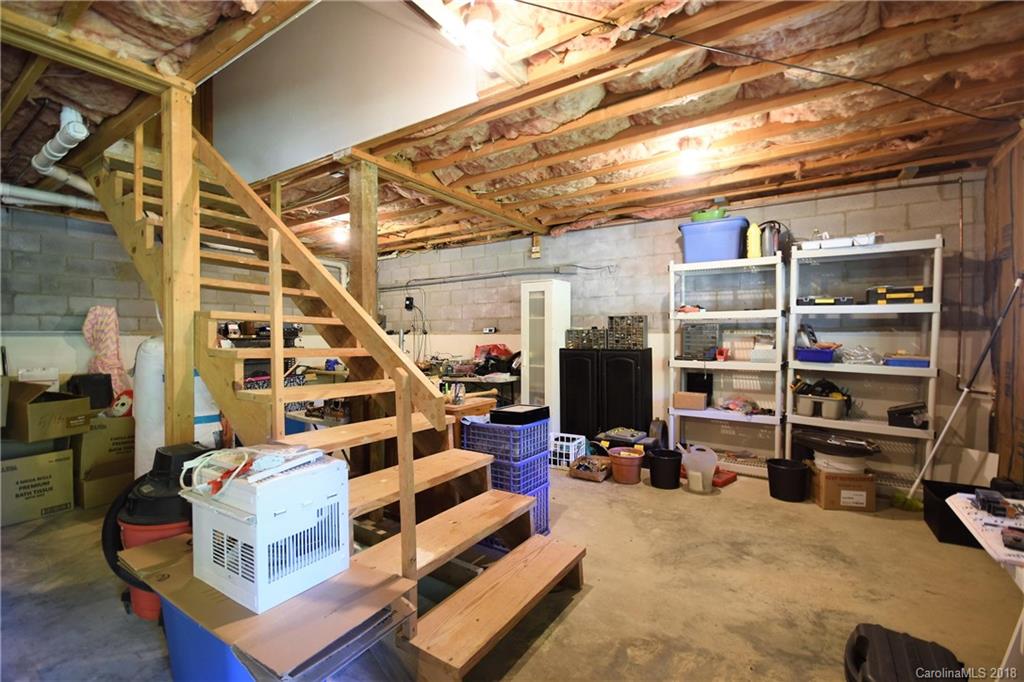 263 Laurel Branch Road Maggie Valley, NC 28751 - Photo 23 of 32 a view of entryway with workspace and stairs