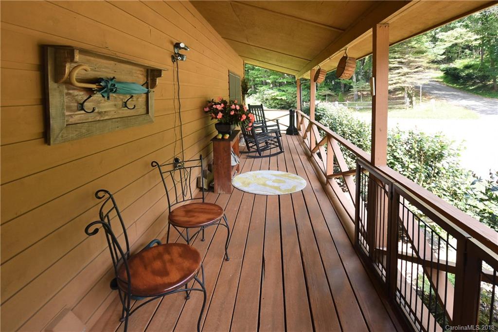263 Laurel Branch Road Maggie Valley, NC 28751 - Photo 25 of 32 a view of a chairs and table in patio