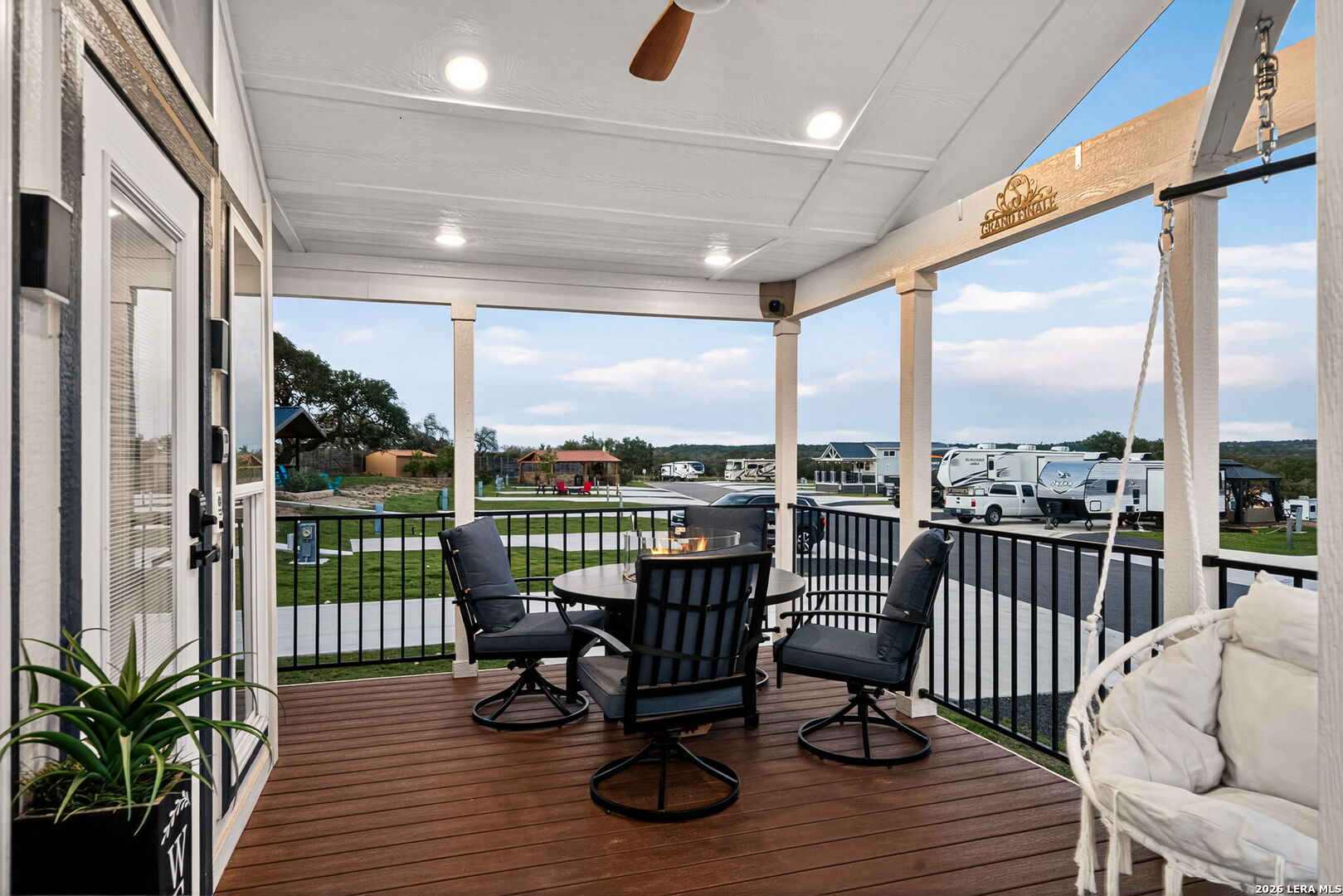 5386 Ranch Road 1376, Unit 64 Fredericksburg, TX 78624 - Photo 16 of 45 a view of a balcony with wooden floor