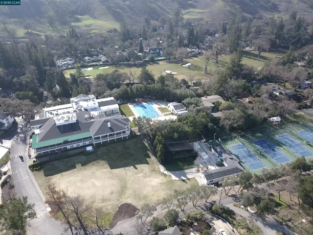 a front view of a house with garage