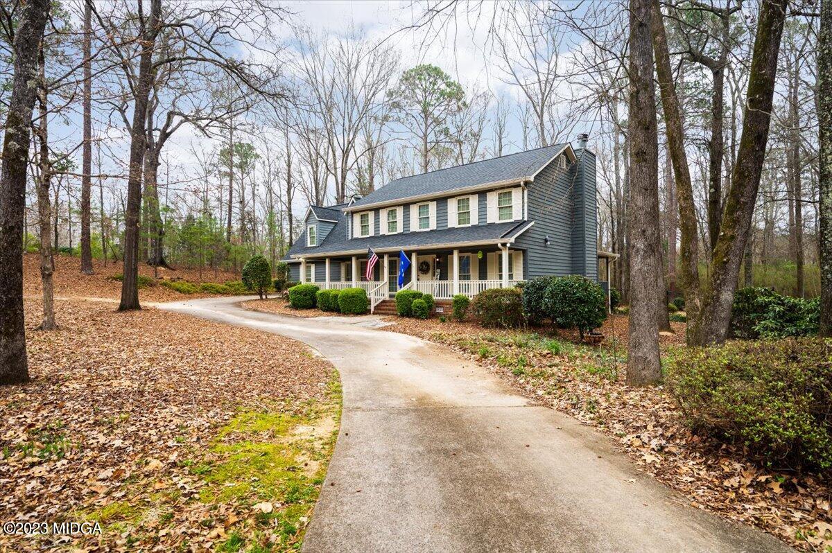 347 Castlegate Road Macon, GA 31210 - Photo 2 of 34 a front view of a house with a yard