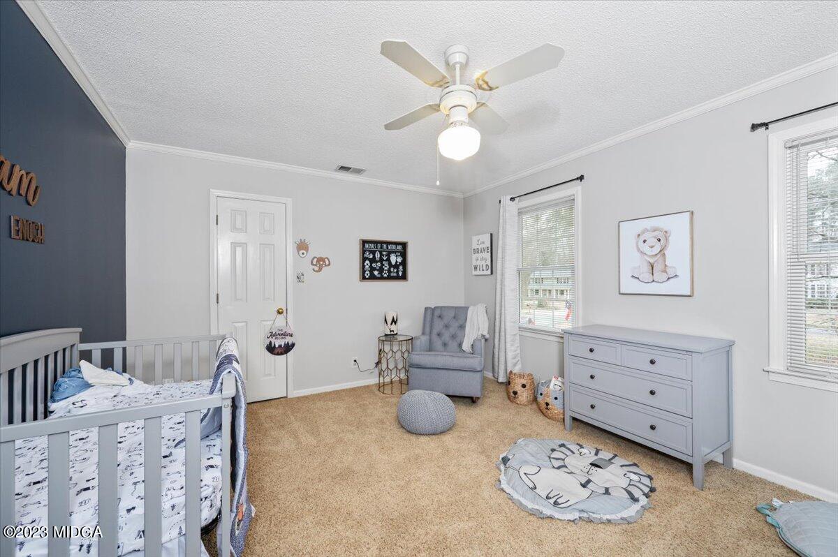 347 Castlegate Road Macon, GA 31210 - Photo 22 of 34 a room with furniture and window
