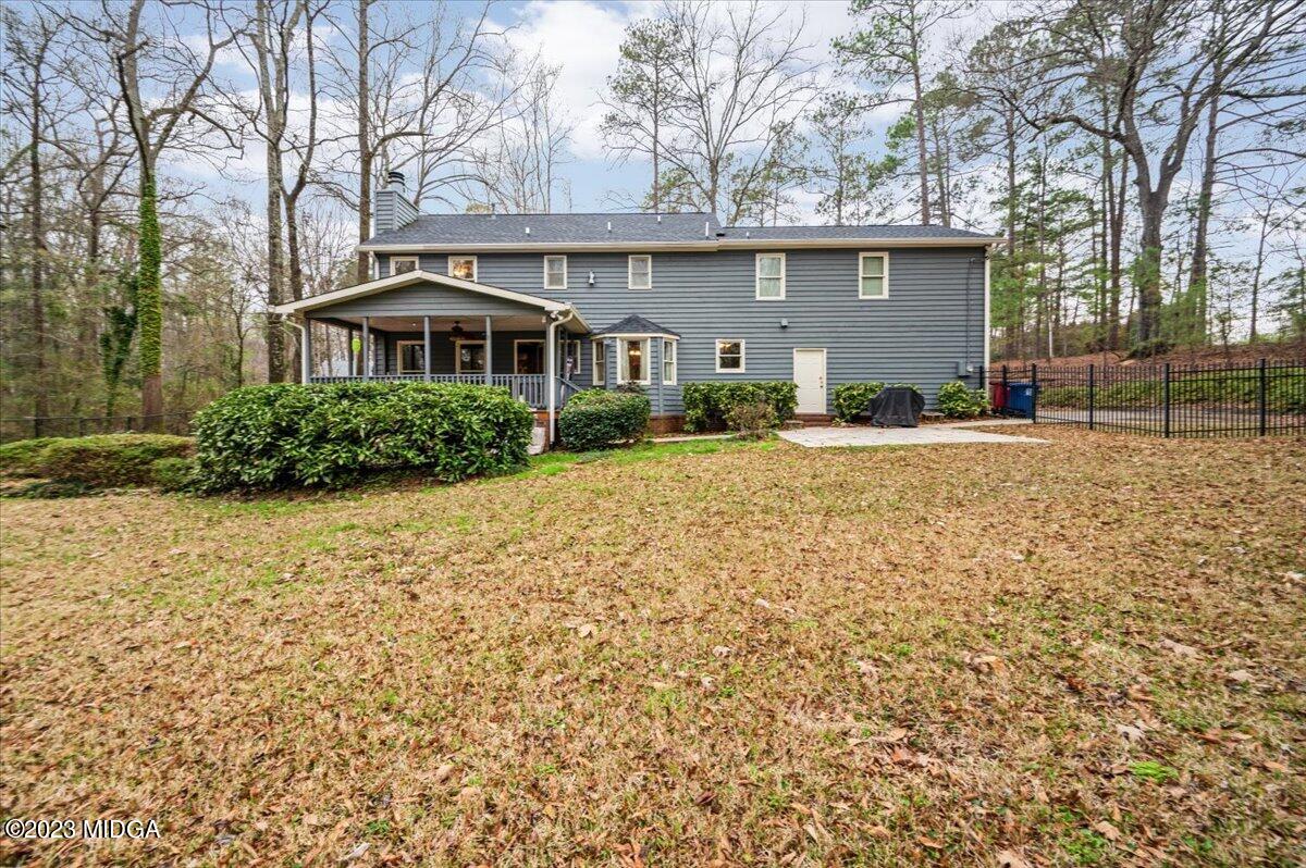 347 Castlegate Road Macon, GA 31210 - Photo 34 of 34 a front view of a house with a yard