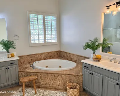 a bedroom with furniture and a fireplace