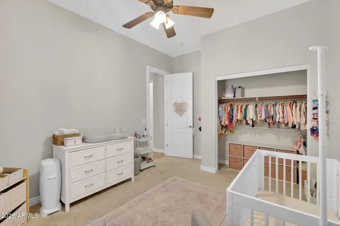 a room with furniture and painting on the wall