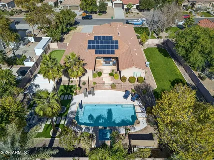 an aerial view of a house with a garden