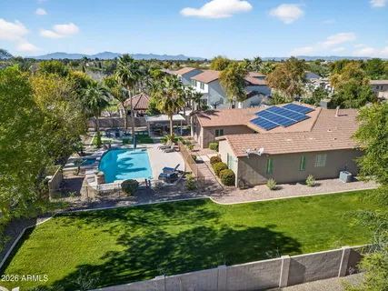an aerial view of a house with a garden