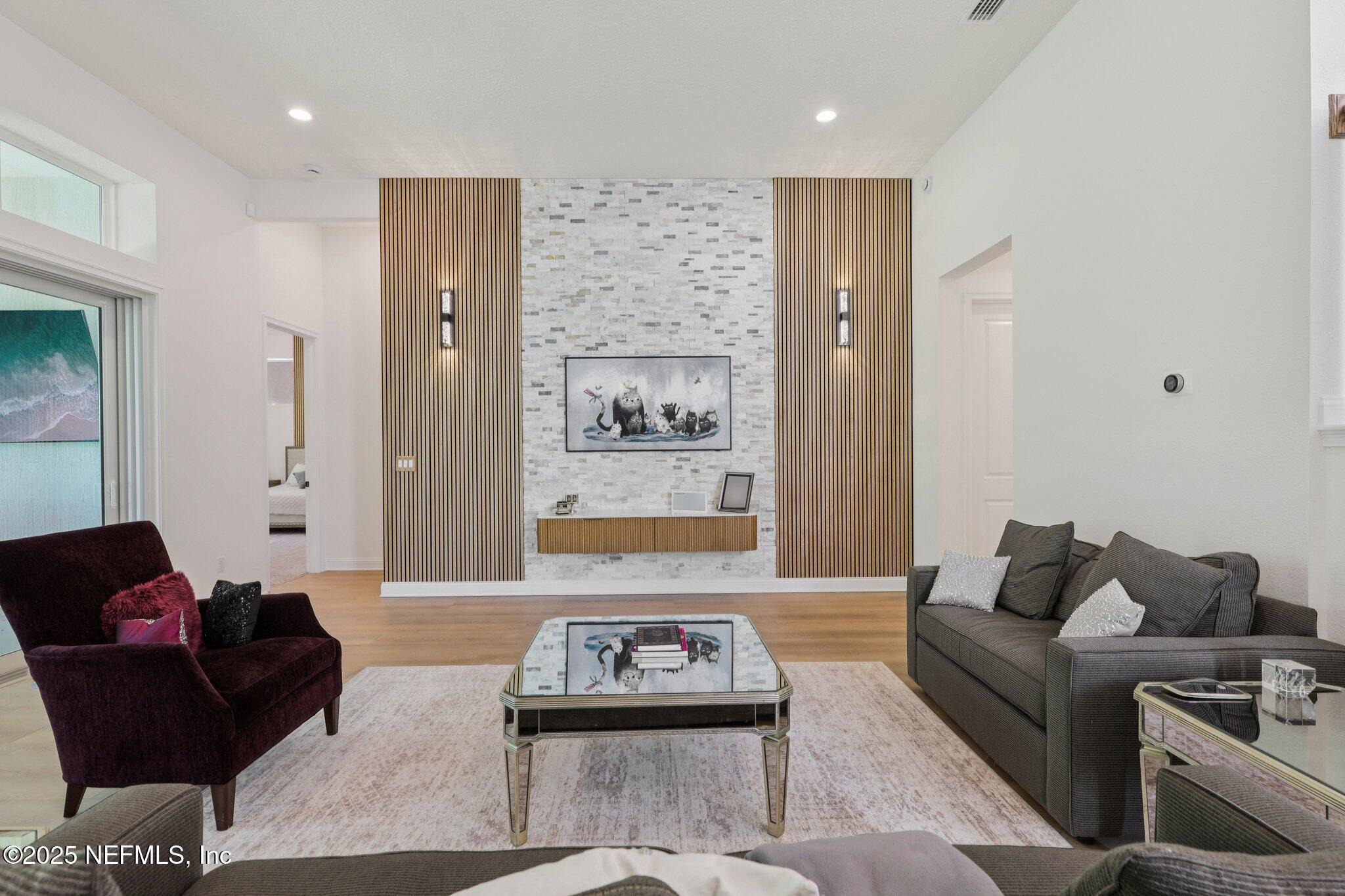 3089 Spiro Circle Jacksonville, FL 32246 - Photo 14 of 83 a living room with furniture and wooden floor