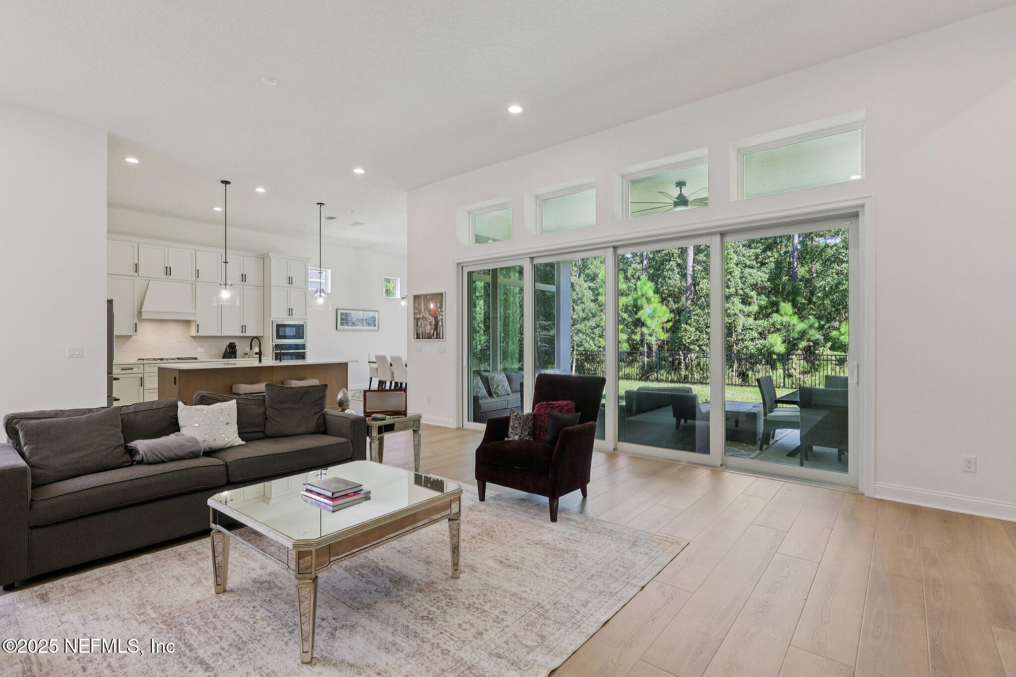 3089 Spiro Circle Jacksonville, FL 32246 - Photo 15 of 83 a living room with furniture and a large window