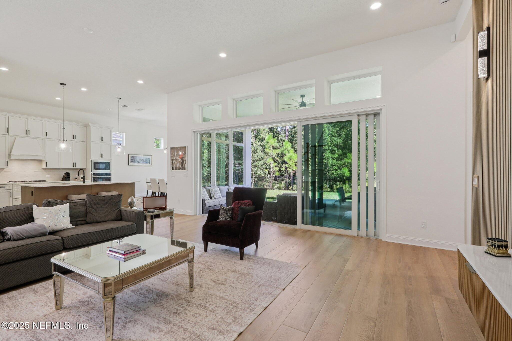 3089 Spiro Circle Jacksonville, FL 32246 - Photo 16 of 83 a living room with furniture and a large window