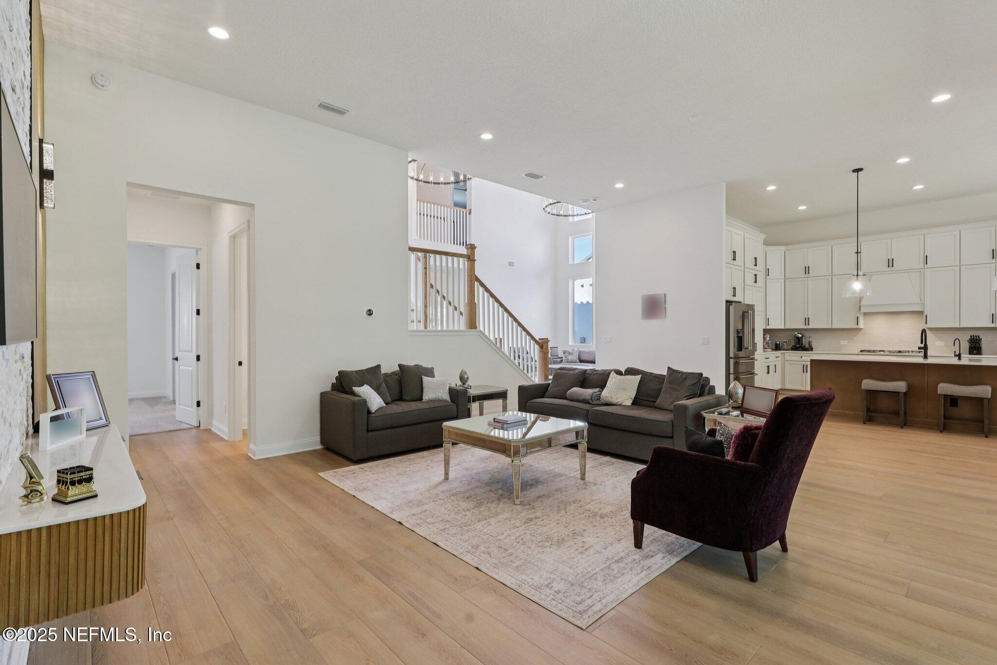 3089 Spiro Circle Jacksonville, FL 32246 - Photo 18 of 83 a living room with furniture and a wooden floor