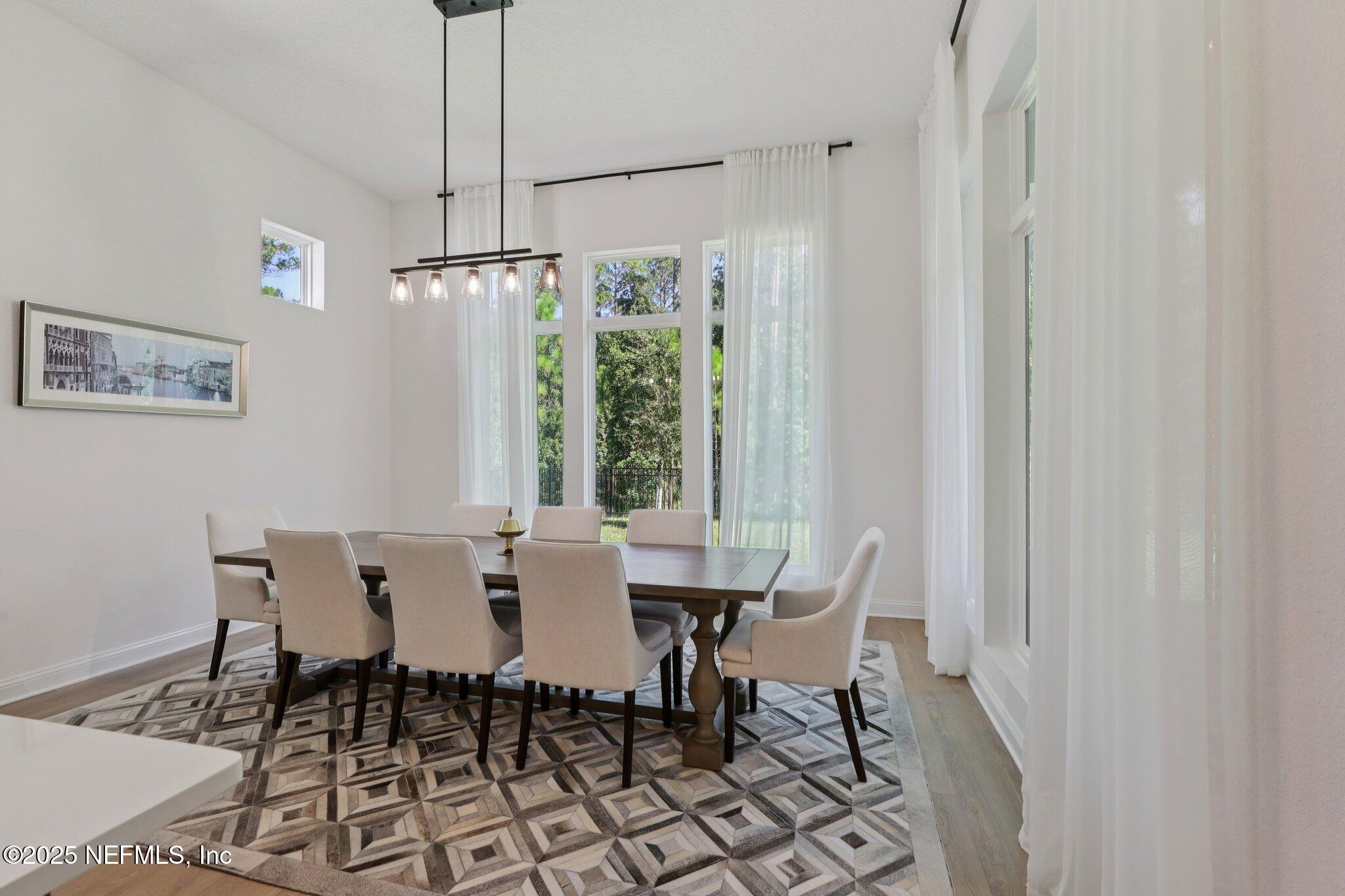 3089 Spiro Circle Jacksonville, FL 32246 - Photo 19 of 83 a view of a dining room with furniture window and outside view