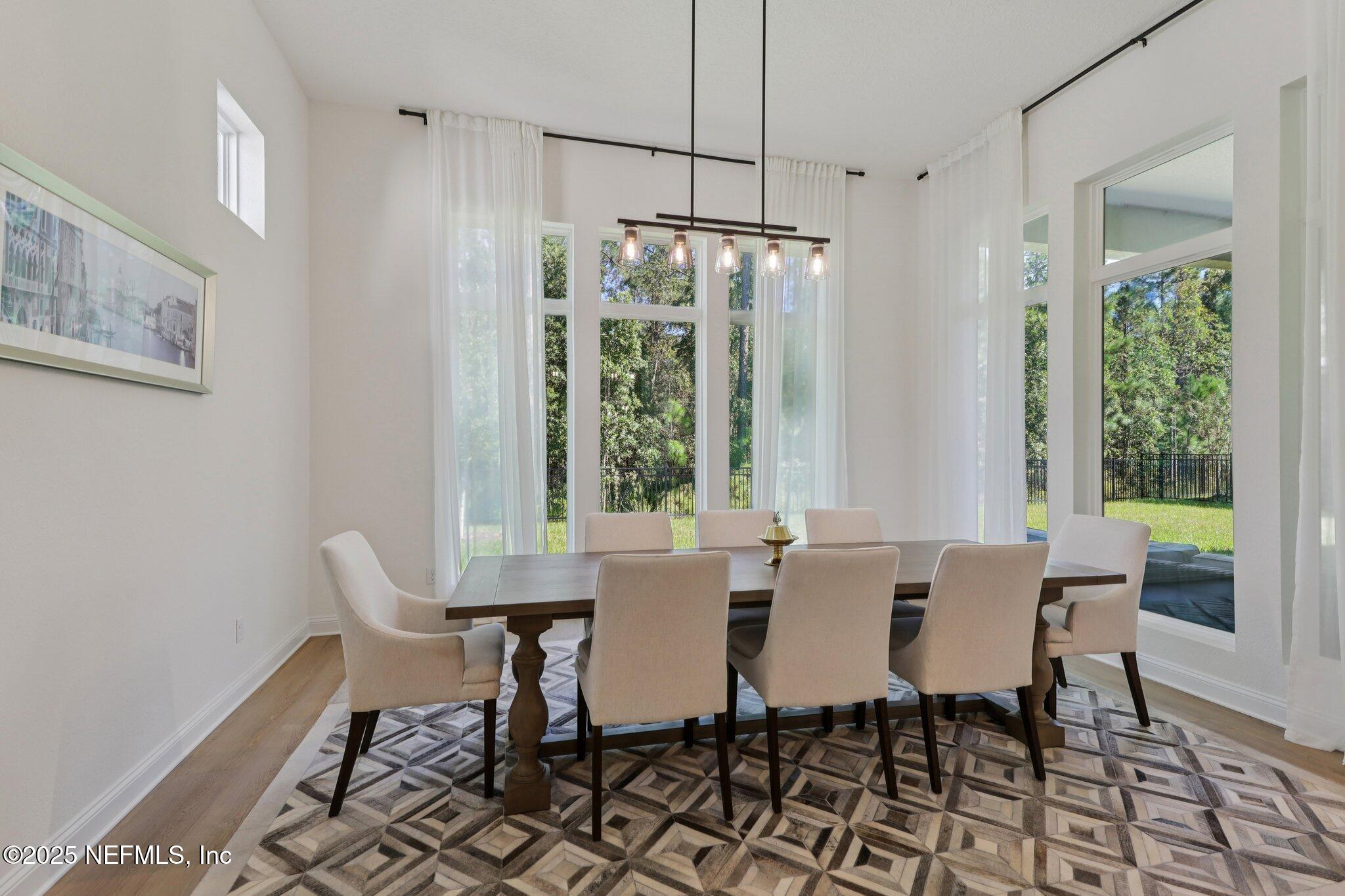 3089 Spiro Circle Jacksonville, FL 32246 - Photo 20 of 83 a view of a dining room with furniture window and outside view