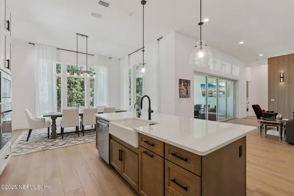 a bathroom with a double vanity sink mirror and double