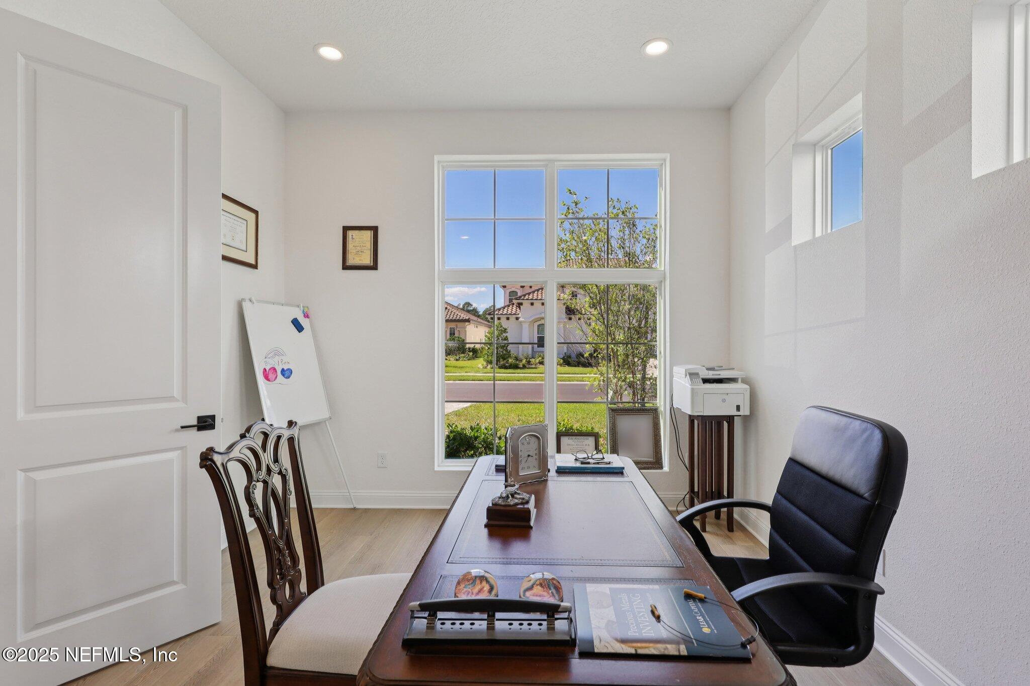 3089 Spiro Circle Jacksonville, FL 32246 - Photo 32 of 83 a view of a workspace with furniture and a window