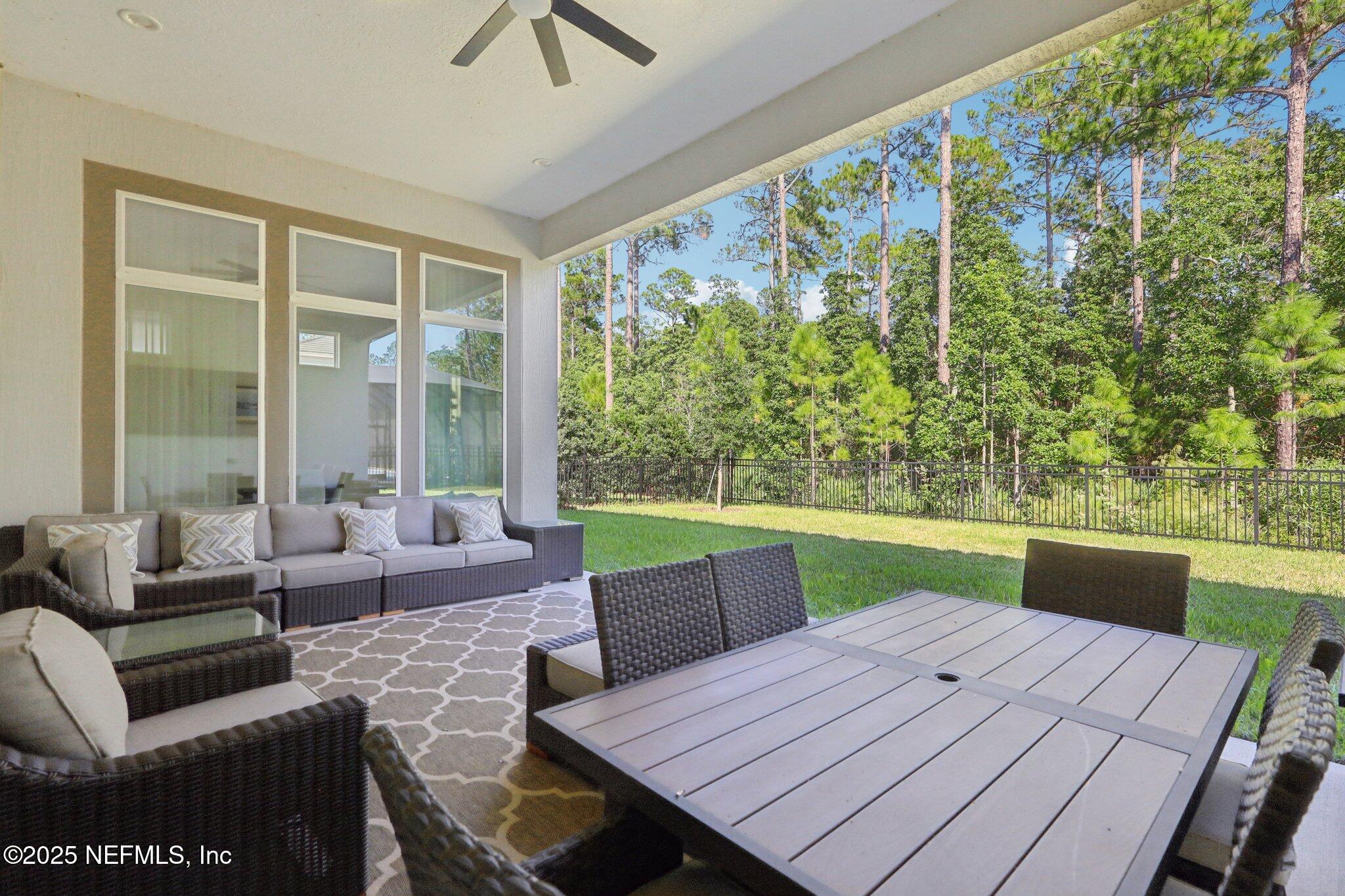 3089 Spiro Circle Jacksonville, FL 32246 - Photo 60 of 83 a view of a dining room with furniture window and outside view