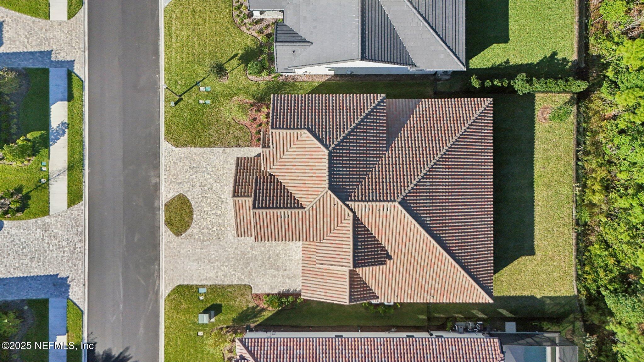3089 Spiro Circle Jacksonville, FL 32246 - Photo 72 of 83 a aerial view of a house with balcony and outdoor seating