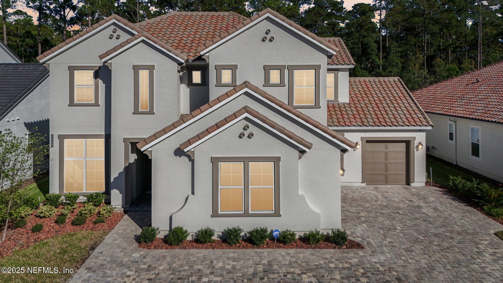3089 Spiro Circle Jacksonville, FL 32246 - Photo 79 of 83 a front view of a house with garden