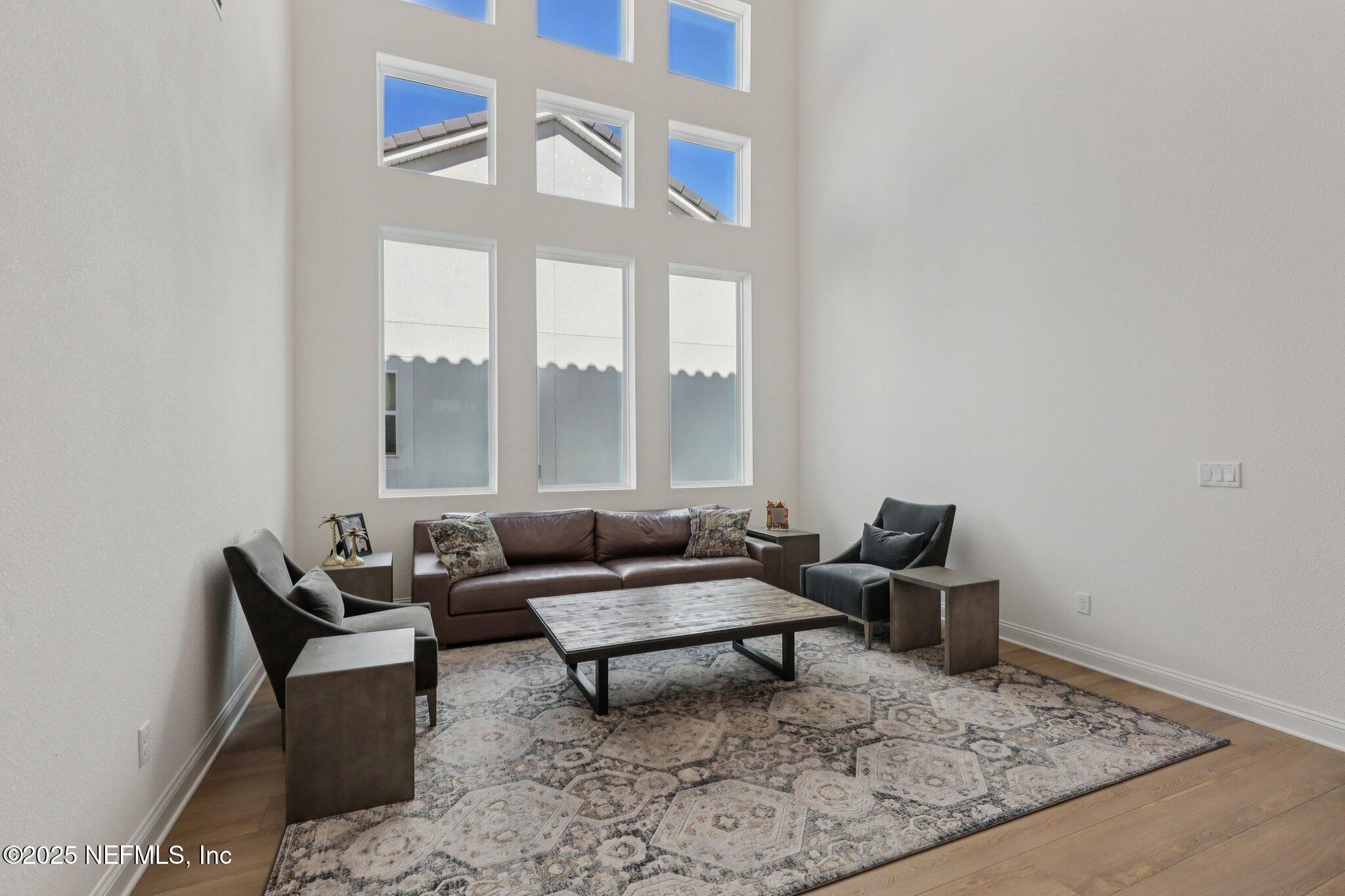 3089 Spiro Circle Jacksonville, FL 32246 - Photo 9 of 83 a living room with furniture and a rug