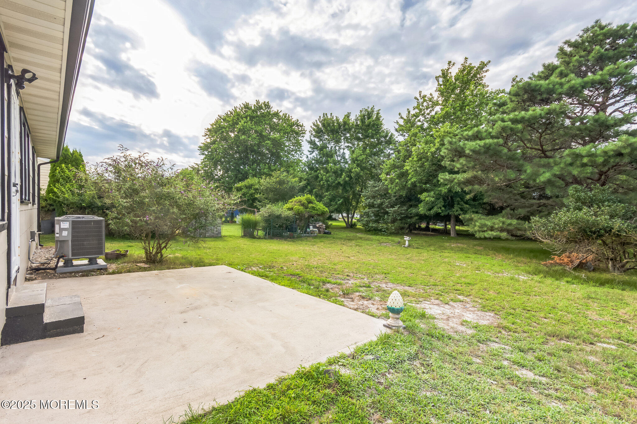 6 Eton Road Toms River, NJ 08757 - Photo 4 of 15 a view of a garden with a sitting area