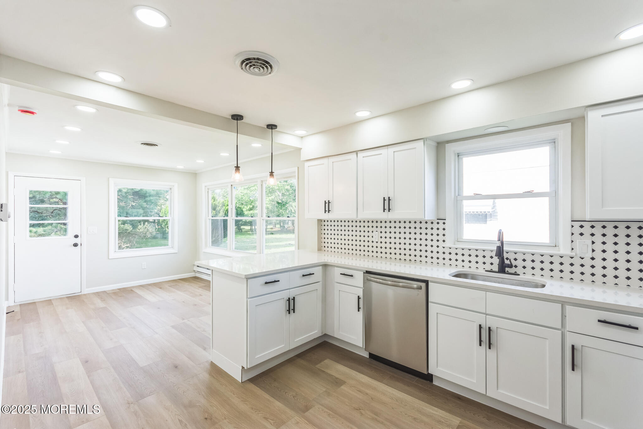 6 Eton Road Toms River, NJ 08757 - Photo 6 of 15 a kitchen with a sink window and cabinets
