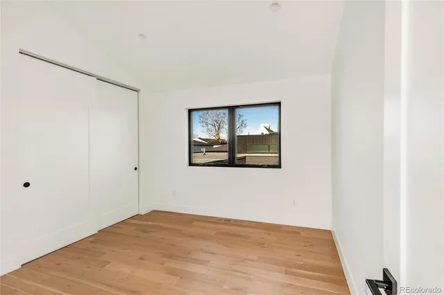 a view of a room that has a window in it