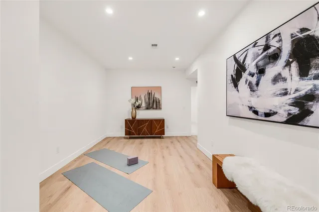 a view of a bedroom with a bed and closet