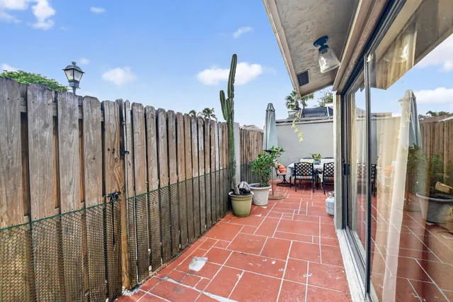 a view of living room and patio