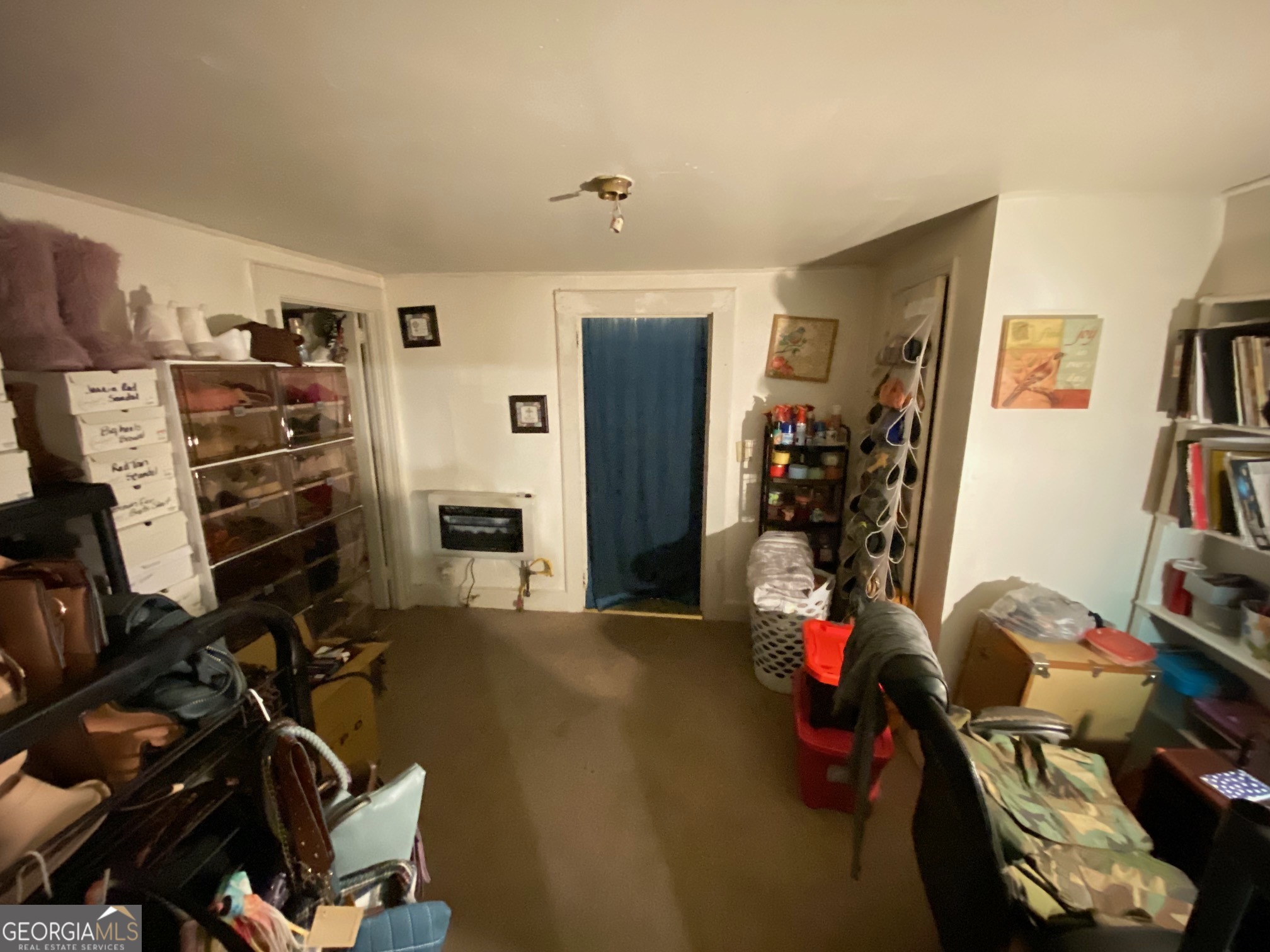 912 Thomas Street Macon, GA 31206 - Photo 14 of 23 a room with gym equipment and a window