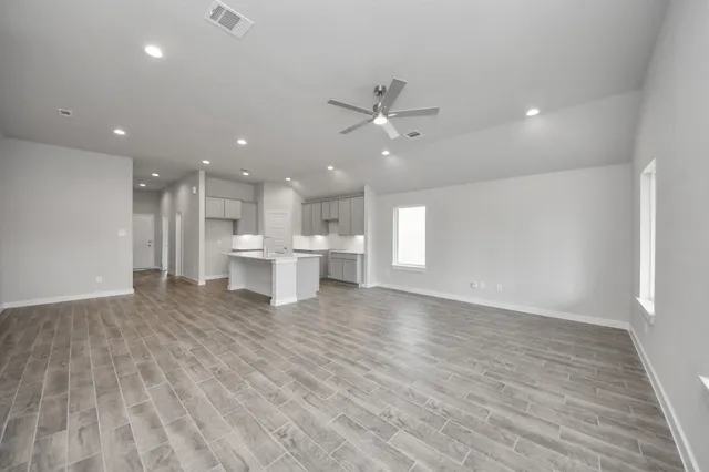 an empty room with windows