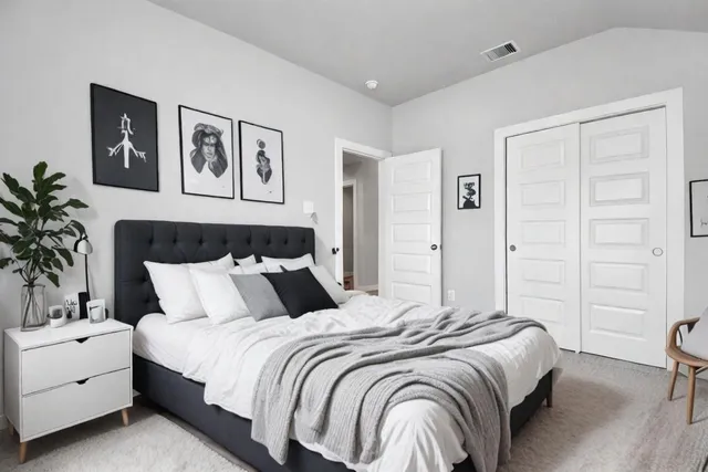 a kitchen with kitchen island sink stove and refrigerator