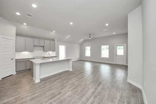a bathroom with a sink a toilet and a bathtub