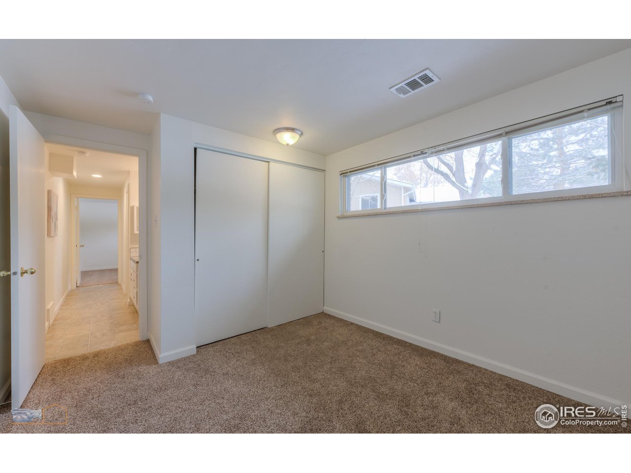 5484 Cypress Drive Boulder, CO 80303 - Photo 20 of 35 a view of an empty room and window